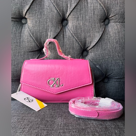 Christian Lacroix Handbags - Christian Lacroix Pink Mini Bag with Logo Accent
